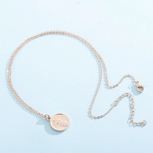 Detail of 18k rose gold Virgin Mary medallion pendant necklace with adjustable chain