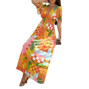 Bohemian V-neck short sleeve maxi dress featuring colorful geometric and tropical leaf print