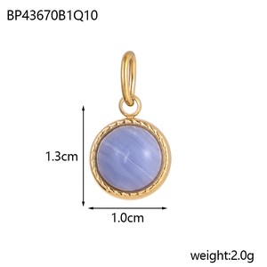 Detail of round light blue agate stone pendant with gold rope edge and size 1.3cm x 1.0cm