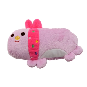 Close-up of pink plush dinosaur dog toy with soft texture and detailed embroidery