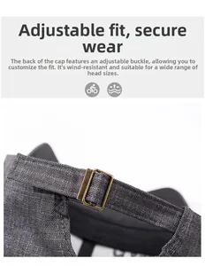 Detail of adjustable metal buckle and thick twill fabric strap on grey baseball cap