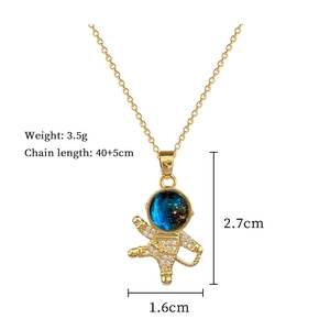 Detailed view of astronaut pendant necklace showing exact weight and dimensions