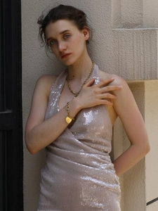 Model wearing 18K gold plated heart pendant necklace and chunky chain bracelet