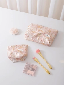 Floral jacquard makeup bag set with large pink flower embroidery and white brand label