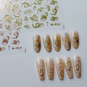 Autocollants nail art dorés et or rose avec motifs floraux vintage et effet métal