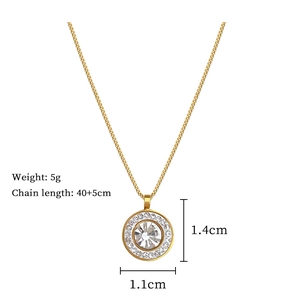 Macro view of gold plated necklace pendant with dimensions 1.4cm by 1.1cm and weight 5g