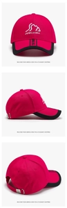 Detail view of pink baseball cap with mountain embroidery and adjustable metal buckle