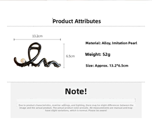 Detail view of large alloy hair claw clip with faux pearl decoration 13.2cm size
