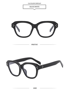 Detail view of black square frame eyewear with classic triple metal rivet accents