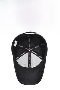 Internal stitching detail of the baseball cap featuring NY&JA logo lining and breathable fabric