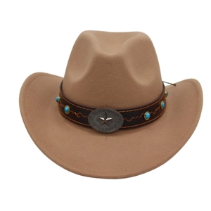 Detail of khaki felt western cowboy hat with brown leather band and turquoise stone star buckle