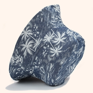 Denim blue sun hat with white palm tree prints and a reversible foldable design