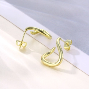 French style gold twisted C-shape hoop earrings with irregular minimalist S-curve design