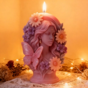 Pink butterfly fairy soy candle with detailed relief flowers and elegant woman figure