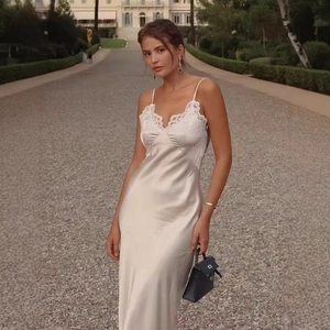 Elegant champagne satin maxi slip dress with white lace trim and thin straps