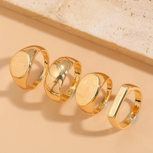Minimalist 14K gold plated geometric ring set featuring four unique luxury band designs