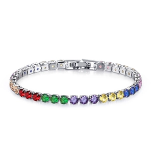 Detailed macro view of rainbow cubic zirconia tennis bracelet with silver metal plating