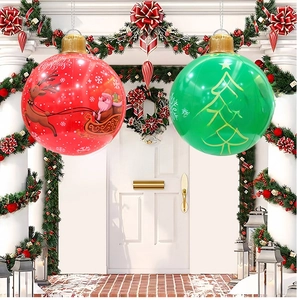 Detail of inflatable red and green Christmas ball ornaments hanging on a festive door