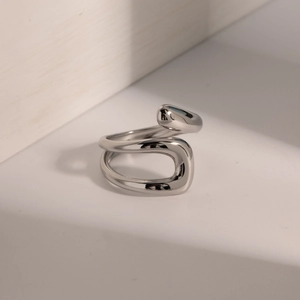 Minimalist silver irregular hollowed ring with polished stainless steel finish