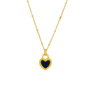 Golden heart necklace with deep blue center and textured gold edges on white background