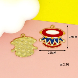 Detailed view of enamel circus drum charm with dimensions 22x25mm and metal texture