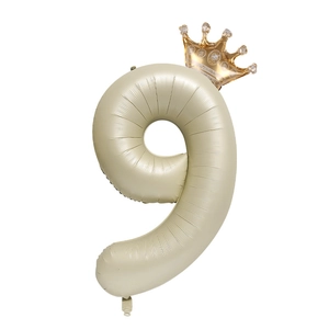 Creamy beige number 9 foil balloon featuring a glittery gold crown for party decorations