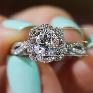 Bague vintage fleur en zircon avec pierre 7mm et anneau pavé entrelacé argenté