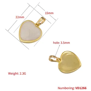 Heart-shaped 18K gold plated pendant with white resin inlay, 22x15mm size reference