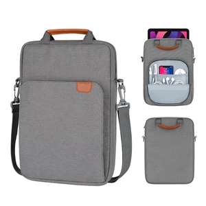 Gray crossbody tablet bag for 11-13 inch iPad with brown leather handles and strap