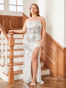 Elegant plus size silver sequin long gown with spaghetti straps and high slit detail