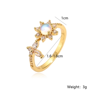 Detailed view of adjustable 18K gold-plated flower ring with zircon and moonstone inlay