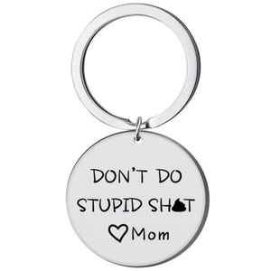 Close-up of stainless steel keychain with Don't Do Stupid Shit Mom engraved text