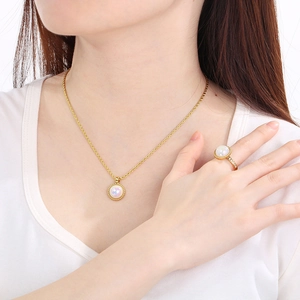 Three-piece gold stainless steel jewelry set with white shell inlay and twisted chain necklace