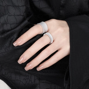 Minimalist S925 sterling silver rings with brushed matte finish on model's hand