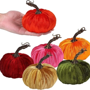 Set of colorful velvet artificial pumpkins in six shades for autumn home decoration