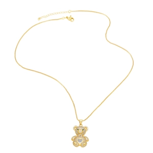 Elegant gold bear necklace with sparkling zircons and a heart-shaped gemstone pendant