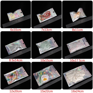 Detailed size chart of laser holographic resealable bags with ruler for scale reference