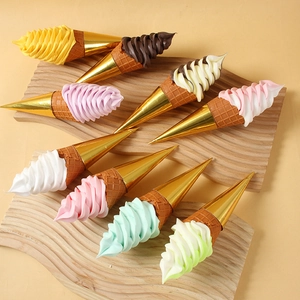 Realistic artificial ice cream cones in assorted flavors for window display and photography