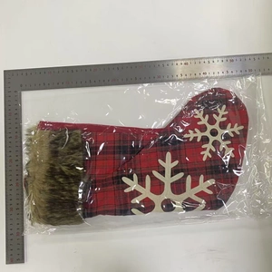 Red and black plaid Christmas stocking with brown faux fur trim and size measurements