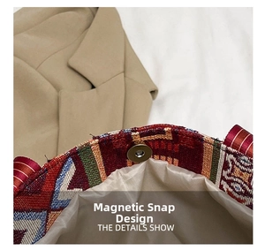 Detail of the magnetic buckle closure on a colorful ethnic woven shoulder bag interior