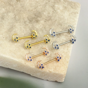 Symmetric moon and blue star nipple rings in gold, silver and rose gold steel