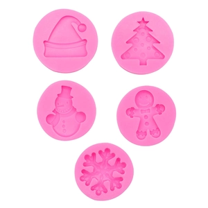 5-piece pink silicone molds set with Christmas tree, snowflake and gingerbread man shapes