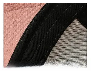 Detail of the pink baseball cap showing the thickened black sweatband and fine stitching