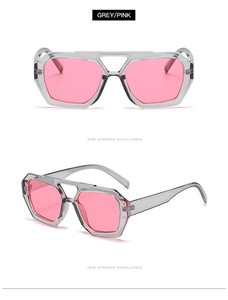 Front and side view of grey translucent geometric sunglasses with pink lenses