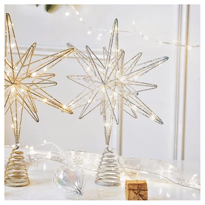 Detail of iron champagne gold and silver LED Christmas tree topper stars with spiral base
