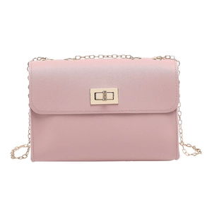 Minimalist pink leather crossbody bag with golden chain strap and buckle closure
