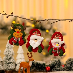 Three-piece Christmas felt ornaments set with reindeer, Santa, and snowman hanging on branches