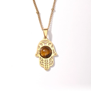 Golden Hamsa Hand pendant necklace featuring a central round tiger eye stone detail