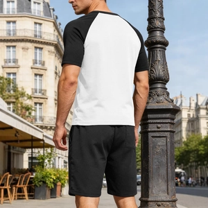 Men's V-neck patchwork sports set with breathable black and white raglan sleeve tee