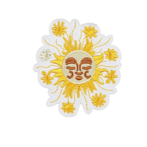 Smiling sun embroidered patch in yellow and orange tones with fine needlework texture